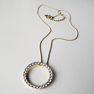 Gold tone circle necklace